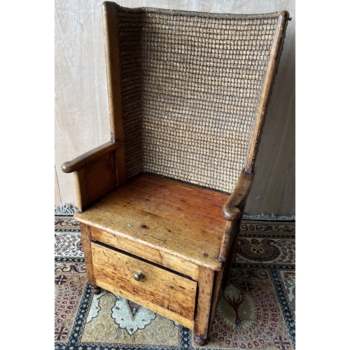 1566 - 19th century pine Orkney chair, woven straw curved back with solid seat and arms above a drawer, on ...