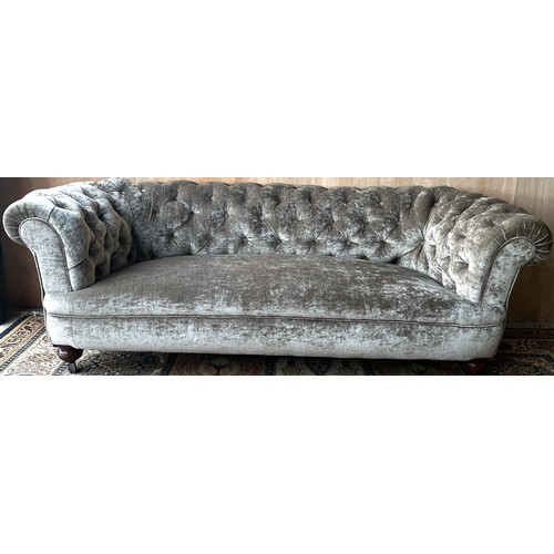 1565 - Victorian Chesterfield sofa with deep buttoned back, reupholstered in crushed grey velvet, on turned... 