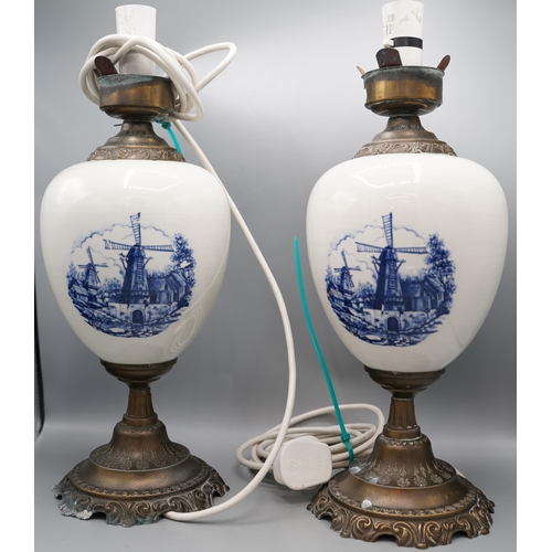 1242 - Pair of 20th century Dutch table lamps, ovoid bodies decorated with Windmills and scrollwork, on tap... 