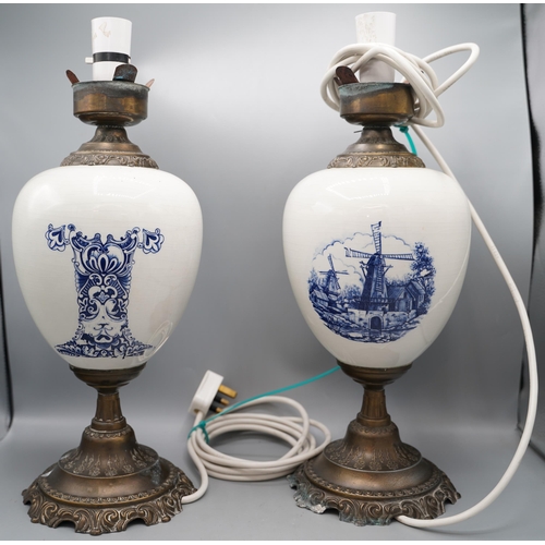 1242 - Pair of 20th century Dutch table lamps, ovoid bodies decorated with Windmills and scrollwork, on tap... 