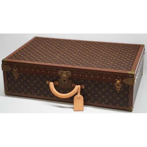 1420 - Louis Vuitton trunk case, brown monogram canvas, rounded leather carrying handle, with gold coloured...