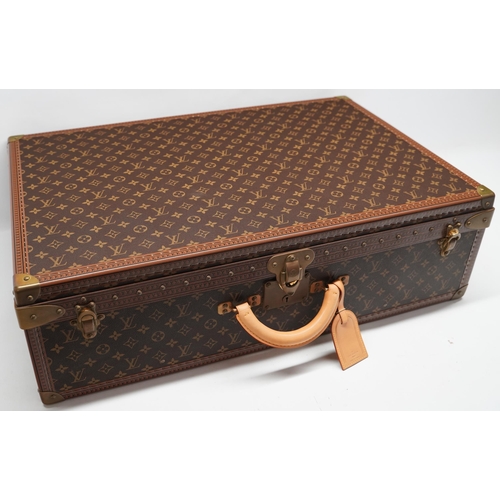 1420 - Louis Vuitton trunk case, brown monogram canvas, rounded leather carrying handle, with gold coloured... 