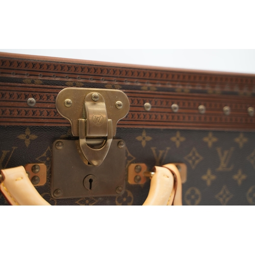 1420 - Louis Vuitton trunk case, brown monogram canvas, rounded leather carrying handle, with gold coloured... 