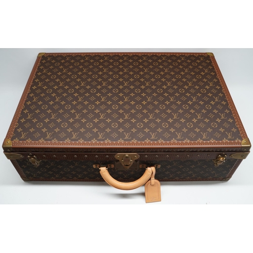 1420 - Louis Vuitton trunk case, brown monogram canvas, rounded leather carrying handle, with gold coloured... 