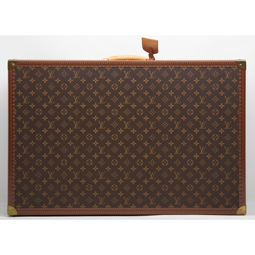 1420 - Louis Vuitton trunk case, brown monogram canvas, rounded leather carrying handle, with gold coloured... 