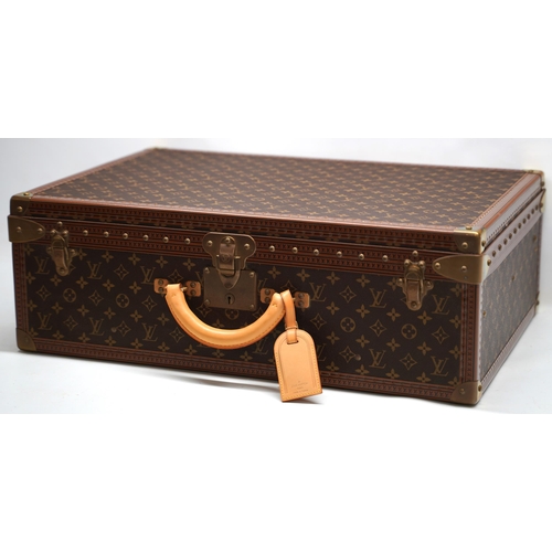 1421 - Louis Vuitton trunk case, brown monogram canvas, rounded leather carrying handle, with gold coloured... 