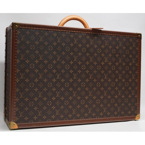 1421 - Louis Vuitton trunk case, brown monogram canvas, rounded leather carrying handle, with gold coloured... 