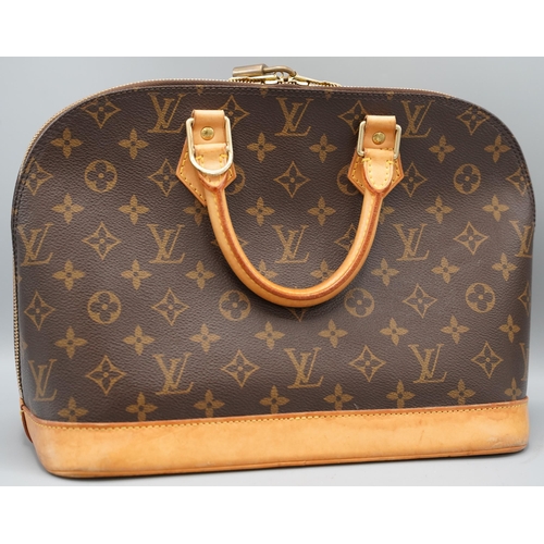 1425 - Louis Vuitton 'Alma' handbag in brown monogram canvas with tan leather trims, gold coloured hardware... 