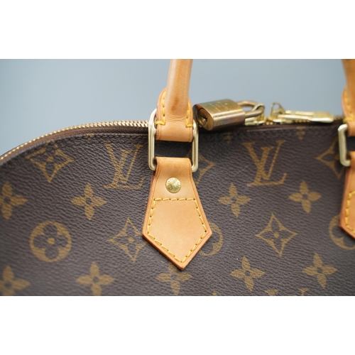 1425 - Louis Vuitton 'Alma' handbag in brown monogram canvas with tan leather trims, gold coloured hardware... 