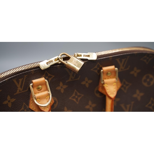 1425 - Louis Vuitton 'Alma' handbag in brown monogram canvas with tan leather trims, gold coloured hardware... 