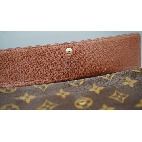 1432 - Louis Vuitton 'Sarah' wallet in brown monogram canvas with gold coloured hardware, flap with press s... 