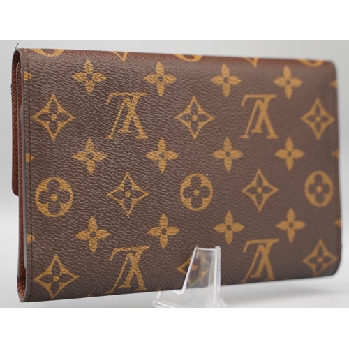 1433 - Louis Vuitton trifold wallet in brown monogram canvas, gold coloured hardware, flap with press stud ... 