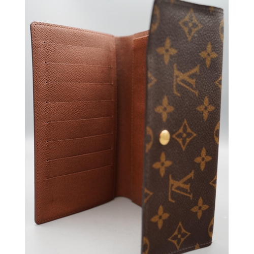 1433 - Louis Vuitton trifold wallet in brown monogram canvas, gold coloured hardware, flap with press stud ... 