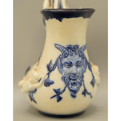 1177 - Minton Majolica flow blue and white 'Askos' wine jug, shape 1420, with mermaid handle, moulded with ... 