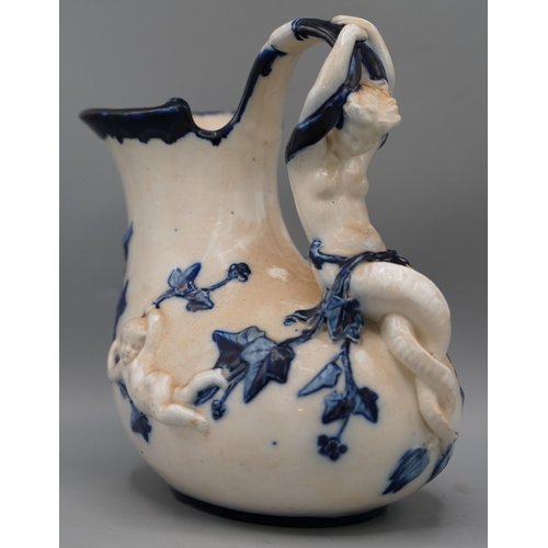 1177 - Minton Majolica flow blue and white 'Askos' wine jug, shape 1420, with mermaid handle, moulded with ... 