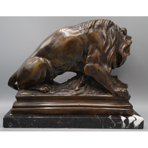 1227 - Follower of Antoine-Louis Barye, patinated bronze model of a lion and boar, on rectangular base and ... 