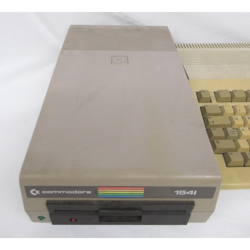 602 - Commodore Single Drive Floppy Disk Model 1541 (lacking power cable) Amiga Commodore A-500 Plus (lack... 