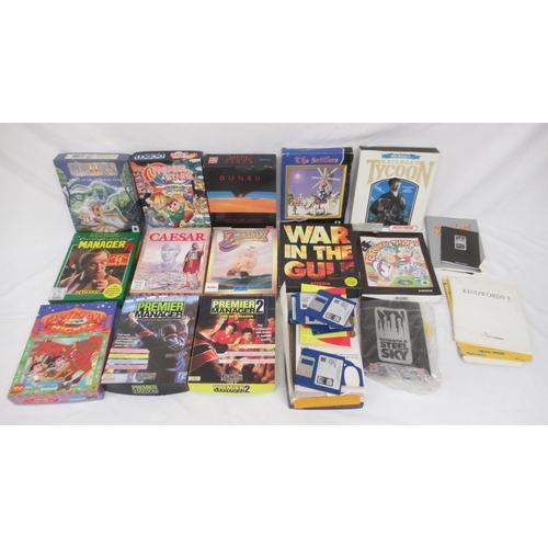 603 - Mixed collection of Amiga games & Commodore cassettes to inc. Dune II, Sid Meiers Railroad Tycoon, T... 