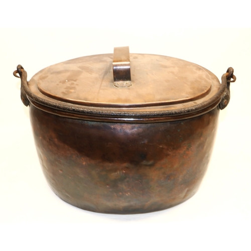 1233 - Large Victorian copper oval saucepan with lid and iron swing handle, D54cm D40cm H42cm