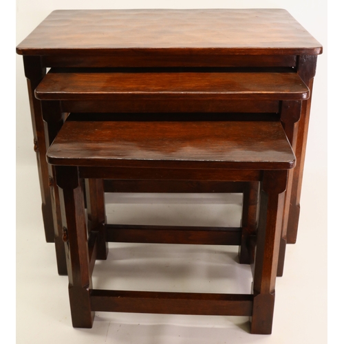 1455 - Robert Mouseman Thompson of Kilburn -  a nest of three oak rectangular tables with adzed tops, octag... 