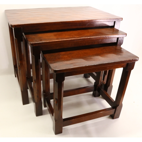 1455 - Robert Mouseman Thompson of Kilburn -  a nest of three oak rectangular tables with adzed tops, octag... 