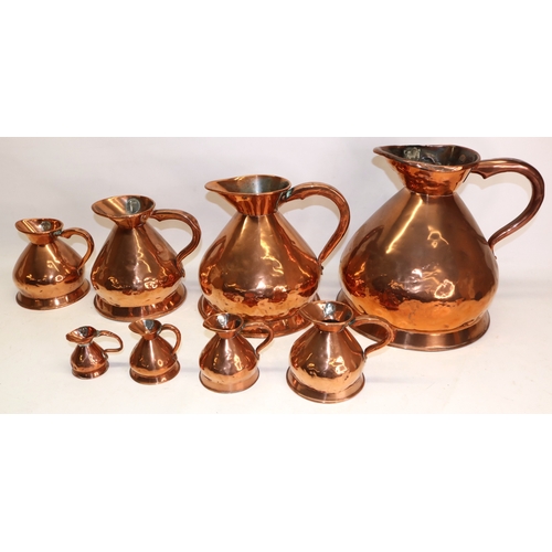 1230 - Set of eight Victorian graduated copper harvest measure jugs, 2 gallon - half gill, by Thomas O Buss... 