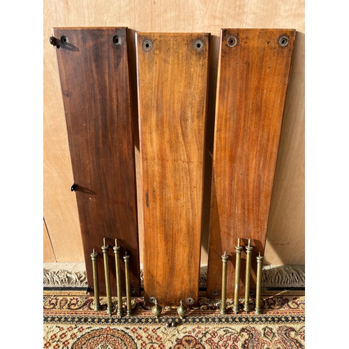 1598 - 19th century campaign bookcase, the three rectangular mahogany shelves joined by turned brass column... 