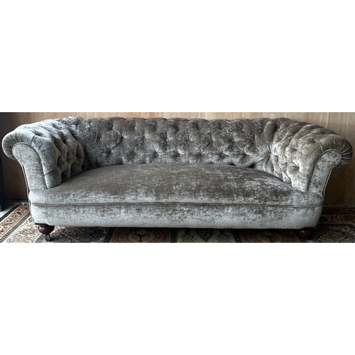 1565 - Victorian Chesterfield sofa with deep buttoned back, reupholstered in crushed grey velvet, on turned... 