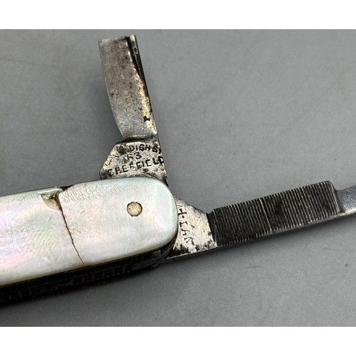 1357 - Sheffield made pocket knife, with two blades, one broken and stamped with cross and Cavendish St 63 ... 