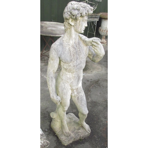 1603 - Weathered composition garden model of a naked Grecian God on naturalistic base, W30cm D30cm H110cm