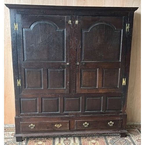 1563 - 18th century and later oak livery cupboard, moulded cornice above two fielded arched three panel doo... 