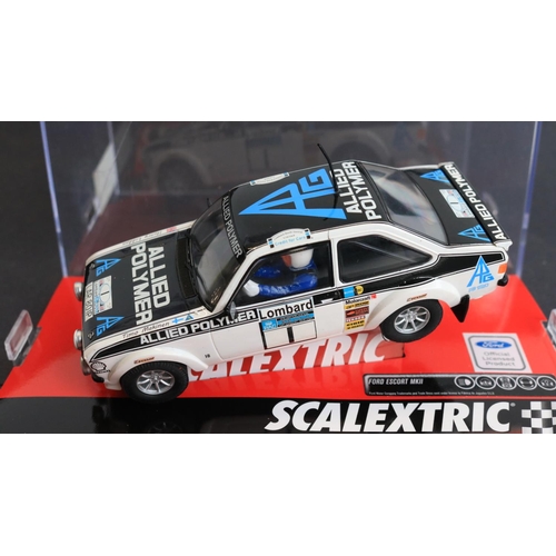 63 - Four 1/32 scale slot car models to include boxed Scalextric Club Ford Escort MKII 'Makinen-Liddon' N... 