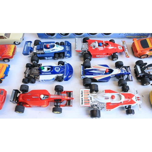 66 - Collection of previously run 1/32 scale slot car models from Scalextric and Polistil to include a bu... 