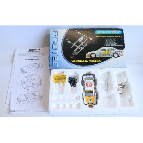 66 - Collection of previously run 1/32 scale slot car models from Scalextric and Polistil to include a bu... 