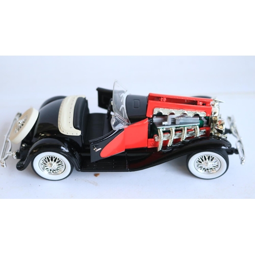 118 - Collection of diecast model sports cars and motorbikes, various scales and manufacturers to include ... 