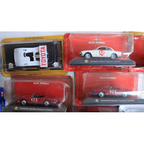 118 - Collection of diecast model sports cars and motorbikes, various scales and manufacturers to include ... 