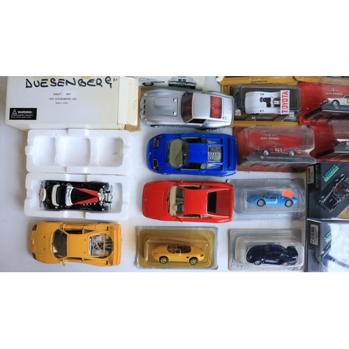 118 - Collection of diecast model sports cars and motorbikes, various scales and manufacturers to include ... 