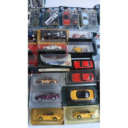 118 - Collection of diecast model sports cars and motorbikes, various scales and manufacturers to include ... 