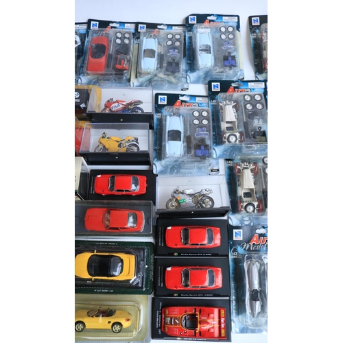 118 - Collection of diecast model sports cars and motorbikes, various scales and manufacturers to include ... 