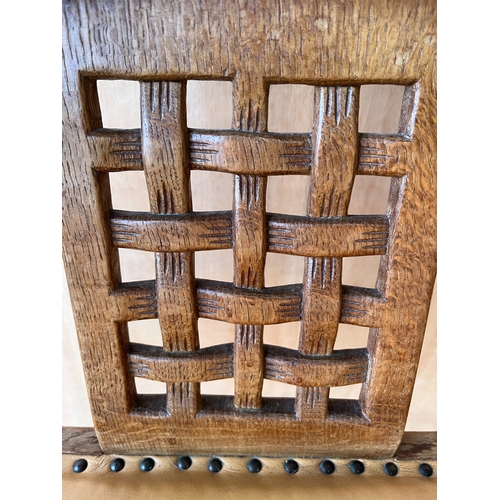 1442 - Robert Mouseman Thompson of Kilburn - an oak Monks chair, curved top rail with three lattice splats ... 