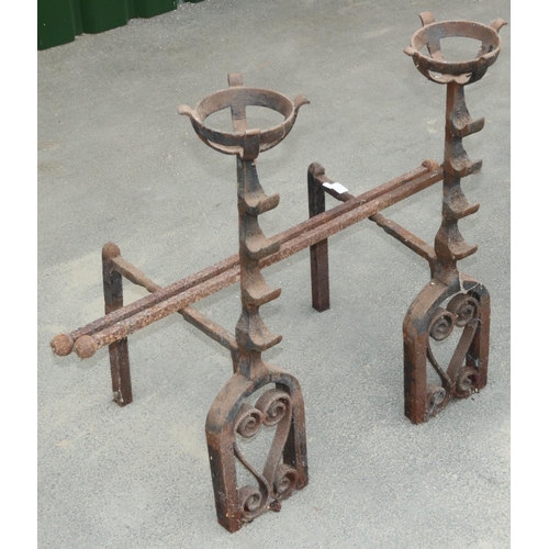 1206 - Pair of cast iron fire dogs, with fire basket finials on curved openwork scrolled supports, H76cm (2... 