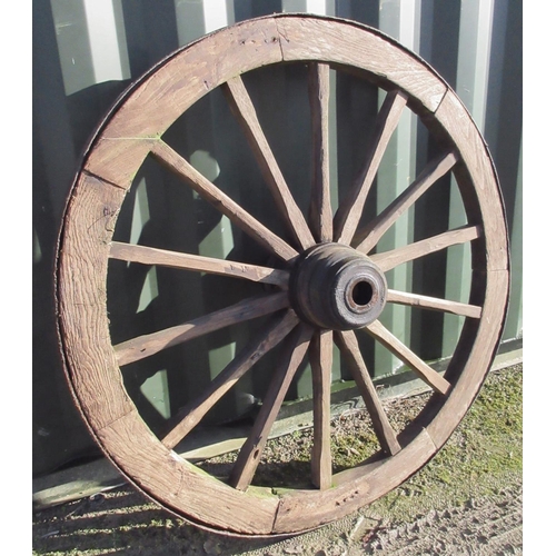 1604 - Large fourteen spoked iron rimmed wooden cartwheel, diameter 135cm