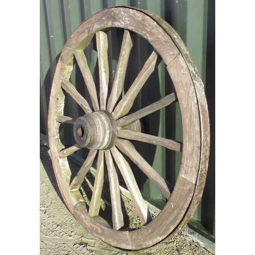 1604 - Large fourteen spoked iron rimmed wooden cartwheel, diameter 135cm