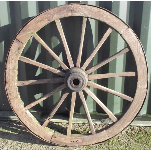 1604 - Large fourteen spoked iron rimmed wooden cartwheel, diameter 135cm