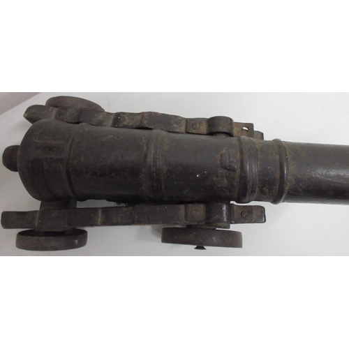 1365 - Victorian cast metal model cannon, 39cm staged barrel on wooden carriage and iron wheels, 40cm overa... 