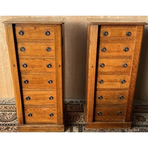 1560 - Pair of 20th century oak Wellington chests, moulded tops above six graduated drawers with ring handl... 