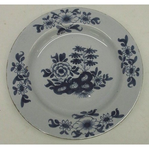 1169 - 18th century Delft circular plate decorated to centre with Chinese style foliage, in similar border,... 