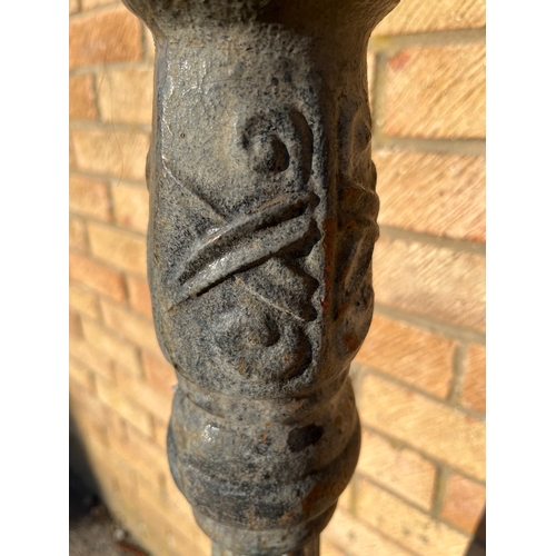 1708 - Cast iron hitching post, horse head and ring finial on fluted column and octagonal base, H134cm