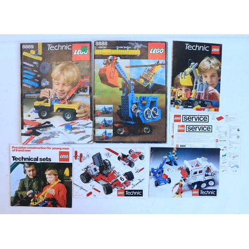 432 - Five vintage Lego Technics sets to include 852 helicopter, 854 racing cart, 8660 snow vehicle, 8845 ... 