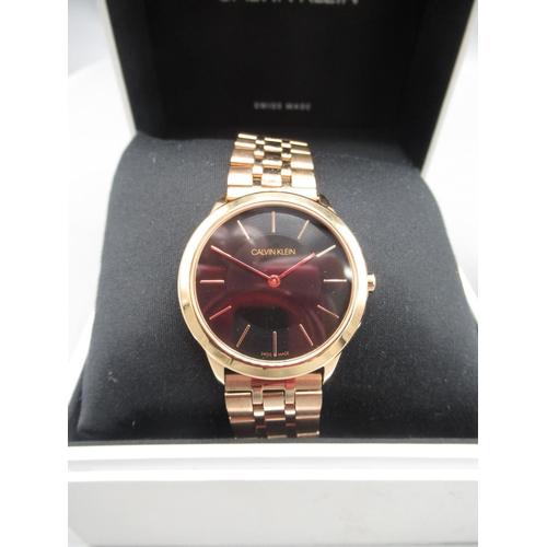 236 - Calvin Klein rose gold coloured quartz dress wristwatch, signed black gradient dial with baton indic... 